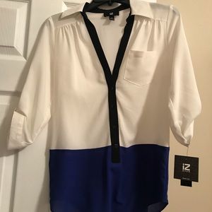 NWT! Brand new blouse!! Size XS (White/Black/Blue)